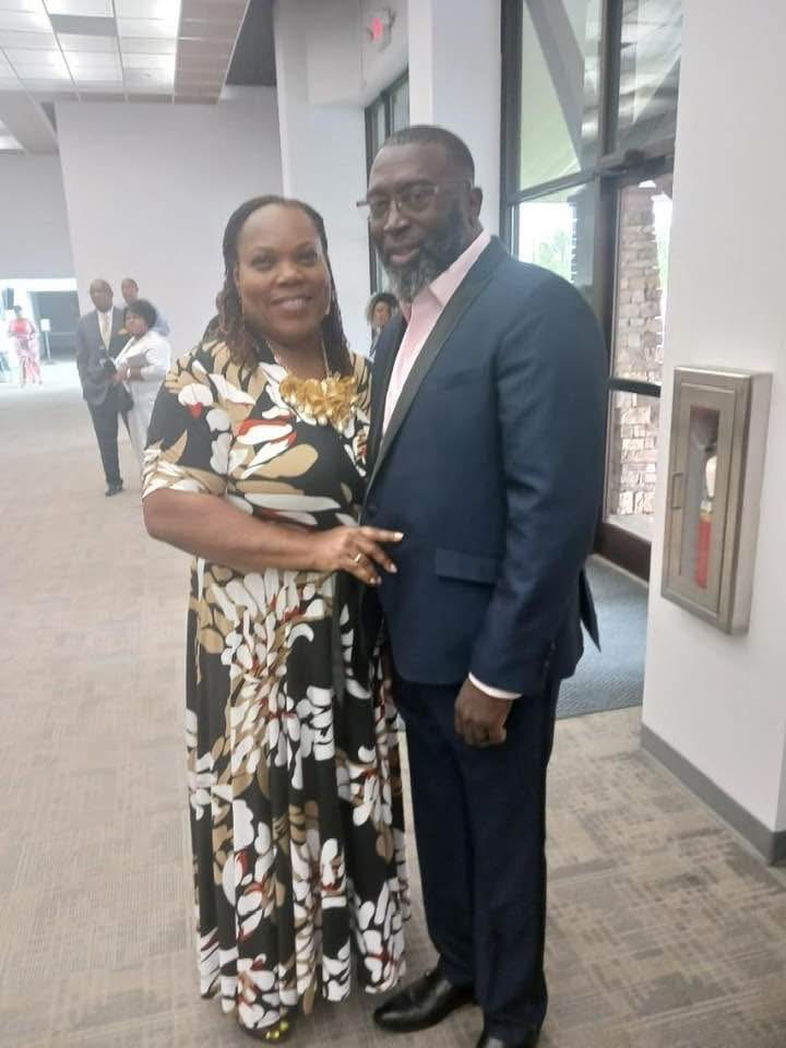 Lewis Howze and his wife, celebrating together